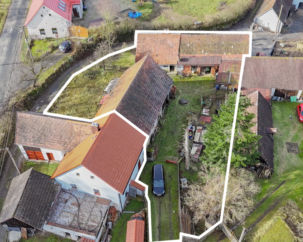 Prodej stavebního pozemku s původním RD v Mladicích